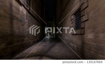 Fast walk through narrow street in the Old Town timelapse hyperlapse, Barcelona. Gothic district illuminated at night Fast walk through narrow street in the Old Town timelapse hyperlapse, Barcelona. Gothic district illuminated at night 139187669