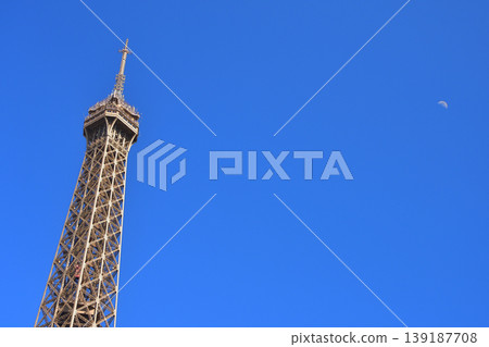 The Eiffel Tower and the moon in the daytime sky, Paris, April 23, 2026 The Eiffel Tower and the moon in the daytime sky, Paris, April 23, 2026 139187708