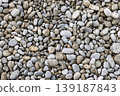 Natural Grey and Brown Sea Pebble Stones Texture Background 139187843