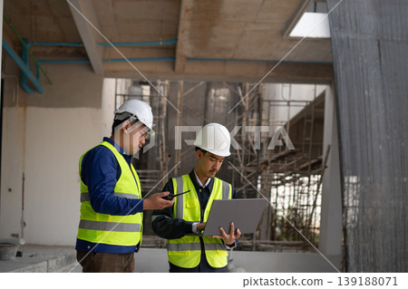 Construction project management meeting building site professional interaction urban environment collaborative viewpoint Construction project management meeting building site professional interaction urban environment collaborative viewpoint 139188071