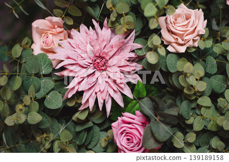 Stylish interior bouquet in pink tones from garden flowers and eucalyptus Stylish interior bouquet in pink tones from garden flowers and eucalyptus 139189158