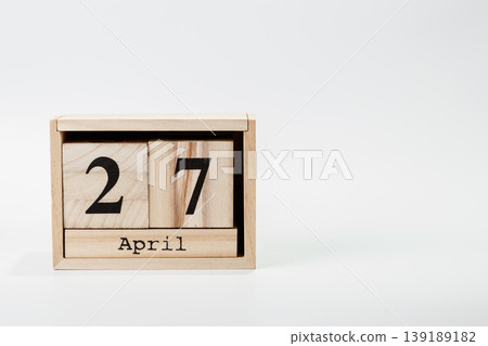 Wooden calendar April 27 on a white background Wooden calendar April 27 on a white background 139189182