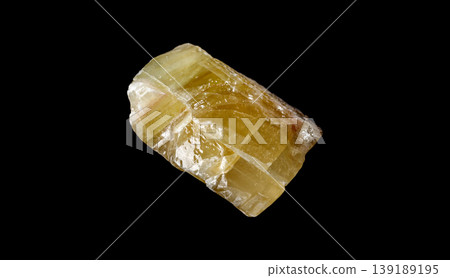 Golden Gemstone Texture: Yellow Calcite Isolated on Black Background Golden Gemstone Texture: Yellow Calcite Isolated on Black Background 139189195