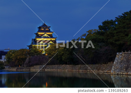 [Hiroshima Prefecture] Night view of Hiroshima Castle illuminated from the inner moat (honmaru and castle tower) 139189263