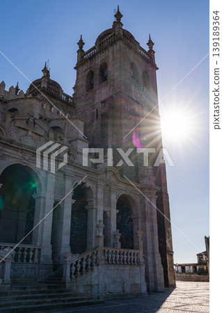 Porto Cathedral facade Se with arches and clock tower in historic center Porto Cathedral facade Se with arches and clock tower in historic center 139189364