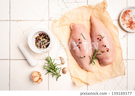 Raw chicken fillet or breasts Raw chicken fillet or breasts 139189377