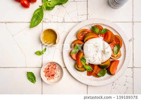 Caprese salad with burrata cheese Caprese salad with burrata cheese 139189378