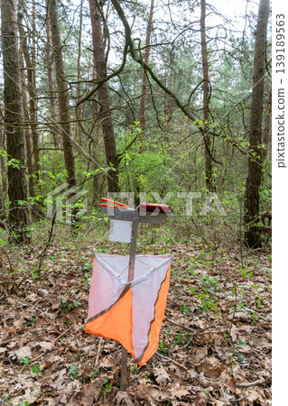 Orange and white orienteering control point flag Orange and white orienteering control point flag 139189563