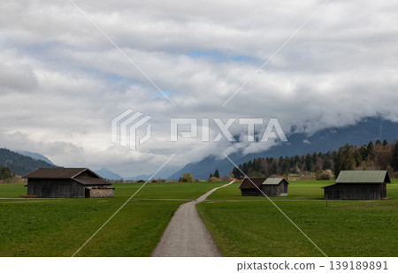 Rural path with wooden houses and mountain landscape Bavaria 139189891
