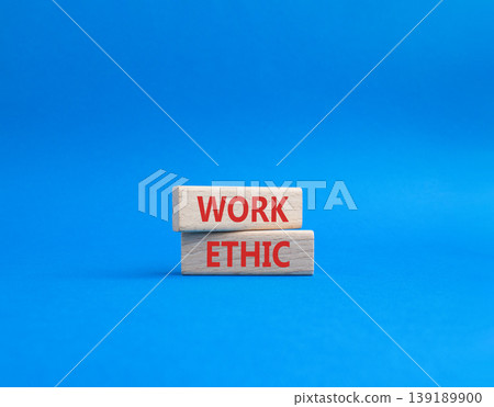 Work Ethic symbol. Concept words Work Ethic on wooden blocks. Beautiful blue background. Business and Work Ethic concept. Copy space. Work Ethic symbol. Concept words Work Ethic on wooden blocks. Beautiful blue background. Business and Work Ethic concept. Copy space. 139189900