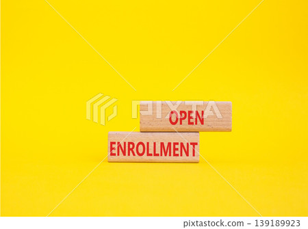Open Enrollment symbol. Wooden blocks with words Open Enrollment. Beautiful yellow background. Business and Open Enrollment concept. Copy space. Open Enrollment symbol. Wooden blocks with words Open Enrollment. Beautiful yellow background. Business and Open Enrollment concept. Copy space. 139189923