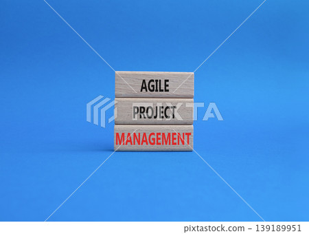 Agile Project Management symbol. Concept word Agile Project Management on wooden blocks. Beautiful green background. Business and Agile Project Management. Copy space Agile Project Management symbol. Concept word Agile Project Management on wooden blocks. Beautiful green background. Business and Agile Project Management. Copy space 139189951