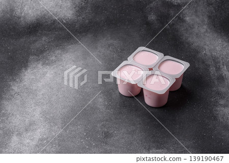 Milky liquid drinking yogurt, a useful food for healthy digestion. Drinking yogurt Milky liquid drinking yogurt, a useful food for healthy digestion. Drinking yogurt 139190467