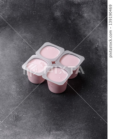 Milky liquid drinking yogurt, a useful food for healthy digestion. Drinking yogurt Milky liquid drinking yogurt, a useful food for healthy digestion. Drinking yogurt 139190469
