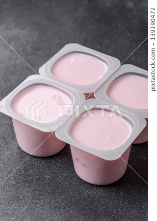 Milky liquid drinking yogurt, a useful food for healthy digestion. Drinking yogurt Milky liquid drinking yogurt, a useful food for healthy digestion. Drinking yogurt 139190472