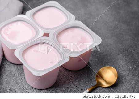 Milky liquid drinking yogurt, a useful food for healthy digestion. Drinking yogurt Milky liquid drinking yogurt, a useful food for healthy digestion. Drinking yogurt 139190473
