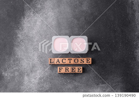 Liquid lactose free yogurt, a useful food for digestive health. Lactose free yogurt Liquid lactose free yogurt, a useful food for digestive health. Lactose free yogurt 139190490