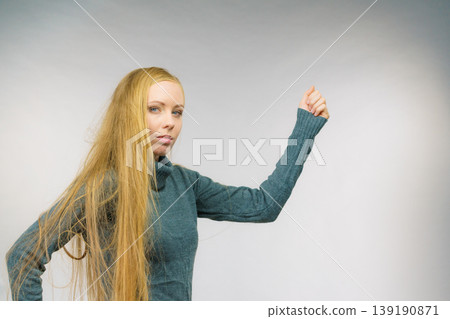 Girl with blonde long hair Girl with blonde long hair 139190871