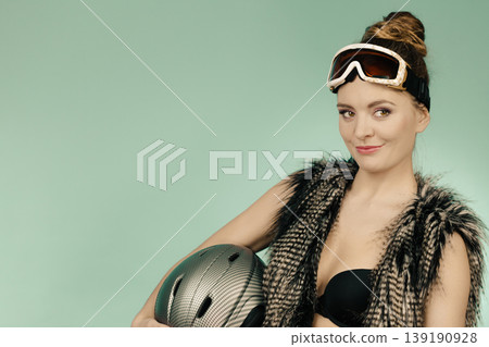 Beautiful girl with goggle and helmet. Beautiful girl with goggle and helmet. 139190928