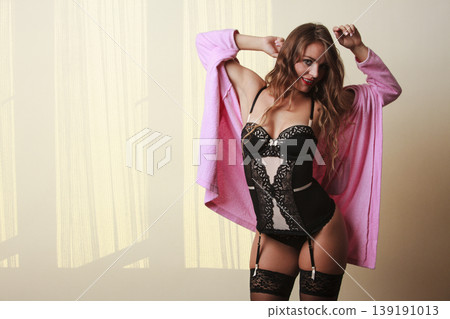 Seductive lady in dressing gown. Seductive lady in dressing gown. 139191013