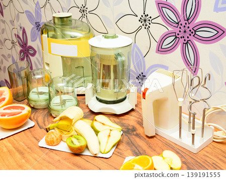 kitchen household appliances and fruit plates on the table 139191555