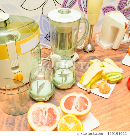 close up of kitchen appliances and fresh fruits on the table 139191611