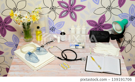 medical equipment and spring flowers on a table in a room medical equipment and spring flowers on a table in a room 139191706