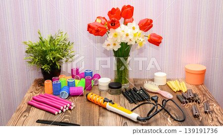 horizontal still life with hair tools and spring flowers in a vase horizontal still life with hair tools and spring flowers in a vase 139191736