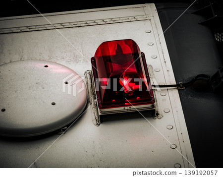 A red flashing police light indicates a crime or emergency. A red flashing police light indicates a crime or emergency. 139192057