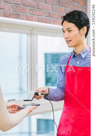 Cashless payment at the register 139192246