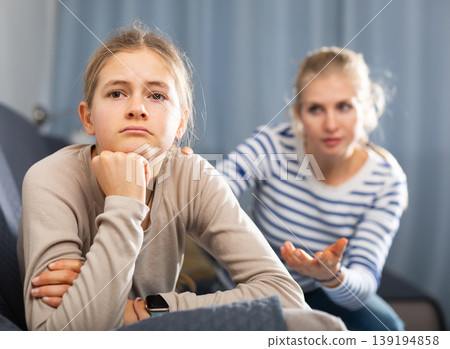 Sad teen girl after discord with her mother Sad teen girl after discord with her mother 139194858