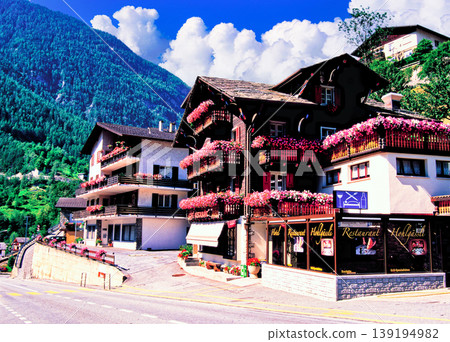 A house surrounded by flowers on the outskirts of Zermatt A house surrounded by flowers on the outskirts of Zermatt 139194982