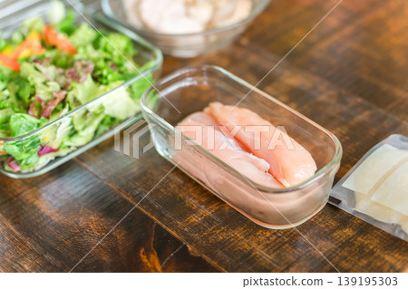 Ingredients lined up in the kitchen: chicken breast, chicken meat, chicken dishes Ingredients lined up in the kitchen: chicken breast, chicken meat, chicken dishes 139195303