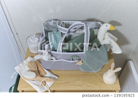 Baby diaper caddy with nursery essentials for child care Baby diaper caddy with nursery essentials for child care 139195925