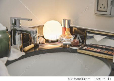 Makeup cosmetics and brushes for beauty routine in bathroom Makeup cosmetics and brushes for beauty routine in bathroom 139196015