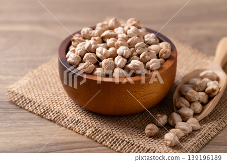 Organic raw chickpeas in a wooden bowl, healthy food ingredient 139196189