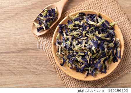 Dried butterfly pea flowers, natural ingredient for herbal blue tea and food coloring Dried butterfly pea flowers, natural ingredient for herbal blue tea and food coloring 139196203