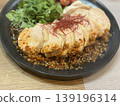 Moist and delicious chicken breast in a drooling sauce 139196314