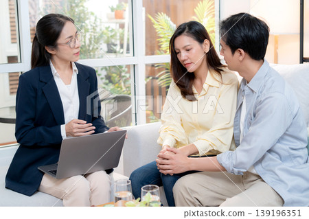 Asian couple therapy counseling and relationship support, mental health, consultation about anxiety. Asian couple therapy counseling and relationship support, mental health, consultation about anxiety. 139196351