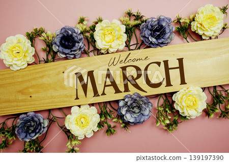 Welcome March text with flowers decoration on pink background Welcome March text with flowers decoration on pink background 139197390
