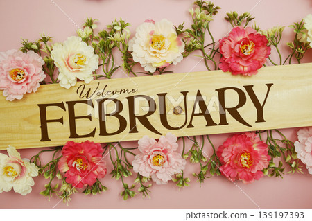 Welcome February text with flowers decoration on pink background Welcome February text with flowers decoration on pink background 139197393