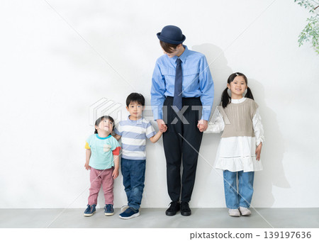 A smiling female security guard and a lost child (Lost and Found Center) A smiling female security guard and a lost child (Lost and Found Center) 139197636