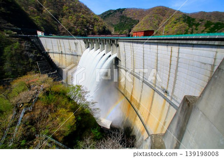 From the beautifully curved arch dam... Kawaji Dam during inspection discharge. From the beautifully curved arch dam... Kawaji Dam during inspection discharge. 139198008