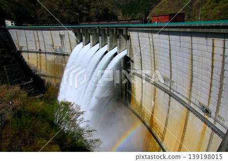 From the beautifully curved arch dam... Kawaji Dam during inspection discharge. From the beautifully curved arch dam... Kawaji Dam during inspection discharge. 139198015