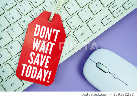 Price tag with text "Don't Wait Save Today!" and white keyboard and wireless mouse Price tag with text "Don't Wait Save Today!" and white keyboard and wireless mouse 139198288