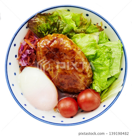 A loco moco bowl (hamburger patty, poached egg, salad) cut out against a white background. 139198482