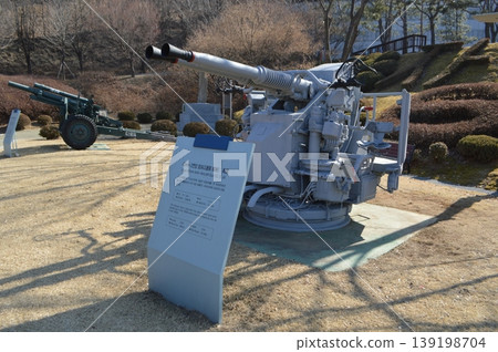 A machine gun on outdoor display at the Dongducheon Museum of Freedom and Peace, South Korea. A machine gun on outdoor display at the Dongducheon Museum of Freedom and Peace, South Korea. 139198704