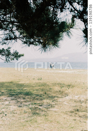 young people looking at the sea young people looking at the sea 139198786