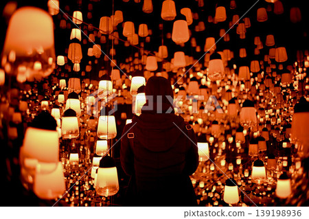 The fantastical light of lanterns and the silhouettes of people The fantastical light of lanterns and the silhouettes of people 139198936