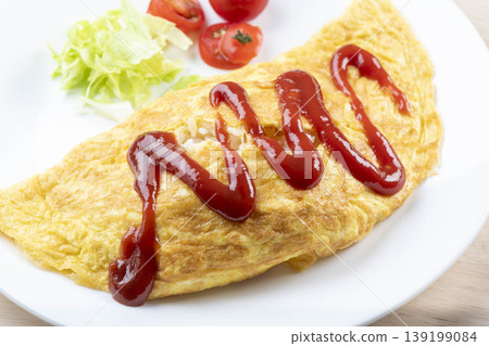 Omelet with ketchup Omelet with ketchup 139199084